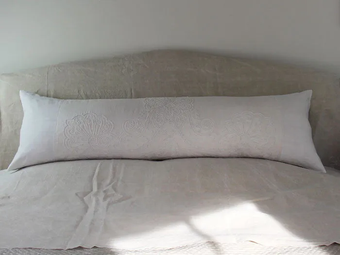 Antique embroidered tulle on linen bolster by Charlotte Casadéjus
